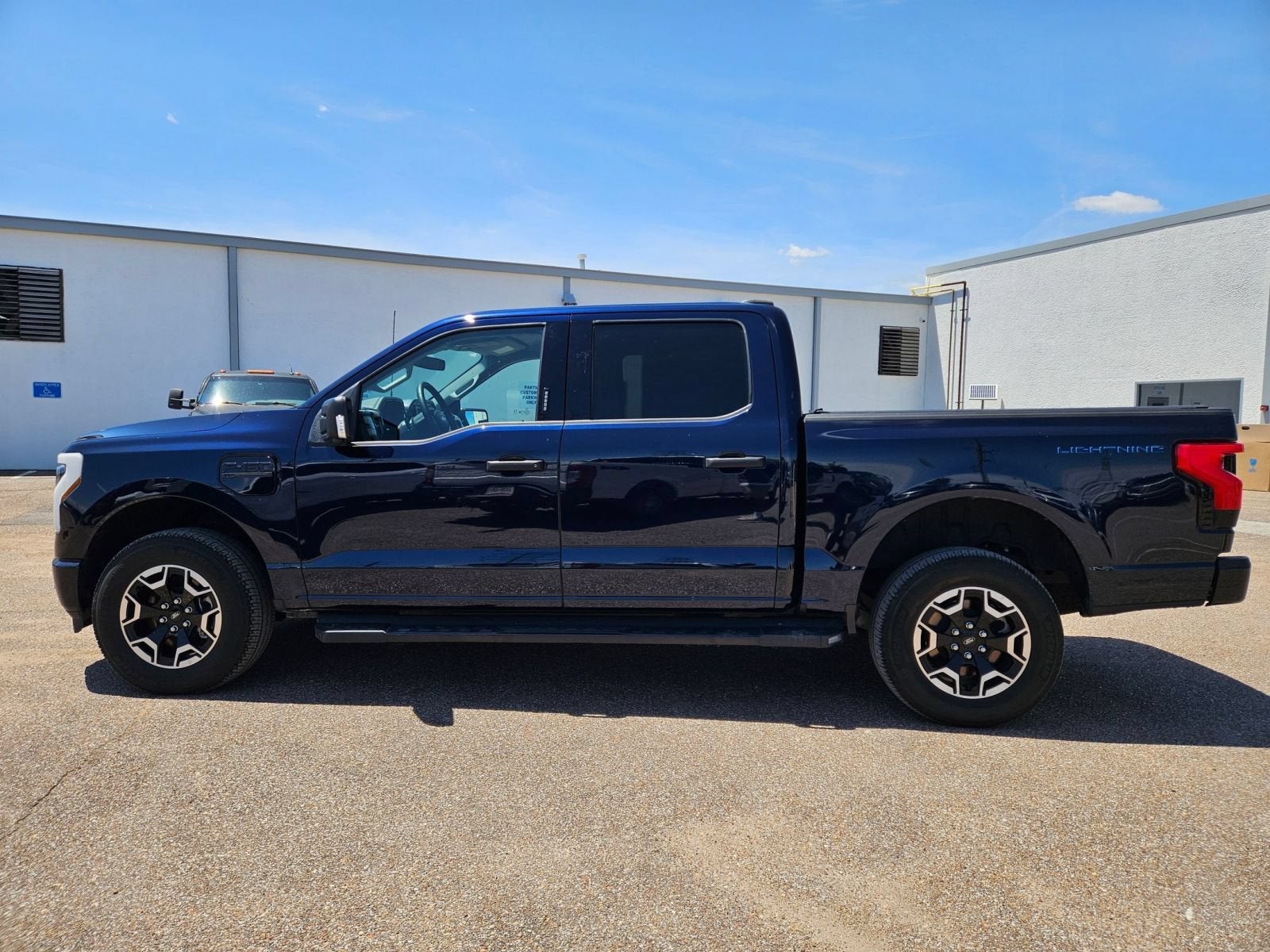 Used 2023 Ford F-150 Lightning XLT with VIN 1FTVW1EL5PWG23375 for sale in Memphis, TN